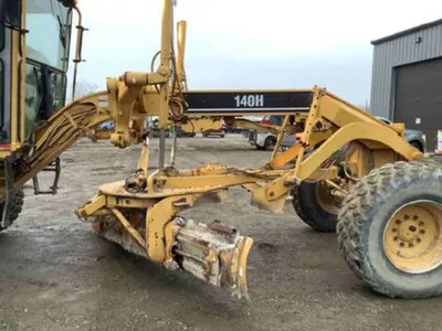 1998 Caterpillar 140HNA