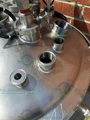USED PRECISION 250 LITER STAINLESS STEEL JACKETED REACTOR 45 PSI W/ LIGHTNIN MIXER.
