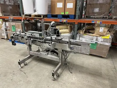 Quadrel model Moduline pressure sensitive wraparound labeler