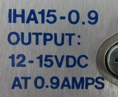 NEW INTERNATIONAL POWER IHA15-0.9 POWER SUPPLY IHA1509 12-15VDC