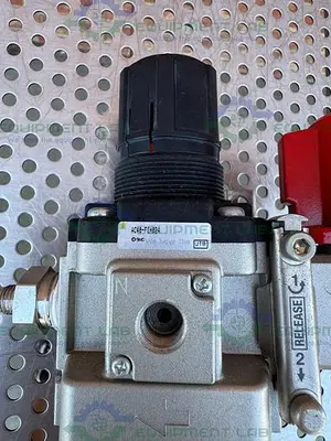 USED SMC AW40-N04-Z FILTER REGULATOR 7-125 PSI W/ SMC VHS40-N04-RZ PRESSURE VALVE