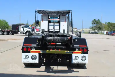 New | in-Stock 2027 PETERBILT 548 Rolloff Trucks Texas US | Roll Off Truck World #1492012