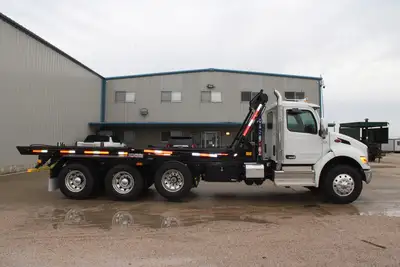 Used 2027 PETERBILT 548 Rolloff Trucks Texas US | Roll Off Truck World #1491999