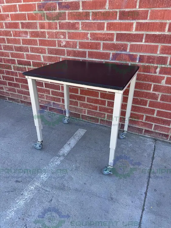 Used PHENOLIC / COMPOSITE RESIN ADJUSTABLE  SCIENCE TABLE WITH WHEELS-30" W X 36" L Furniture (Medical) California US | Equipment Lab #488838