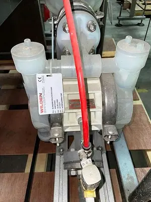 USED APEX FILLING SYSTEMS POF-12 12 SPOUT PRESSURE LIQUID FILLER