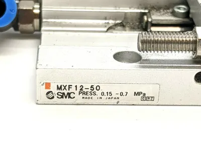 USED SMC SLIDE TABLE CYLINDER 12MM BORE 50MM STROKE