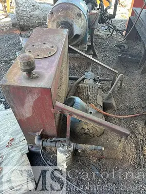 USED MELLOTT MODEL 7 LOG TURNER AND HYDRAULIC UNIT