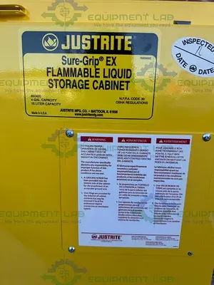 USED JUSTRITE 4 GALLON FLAMMABLE LIQUID STORAGE CABINET W/ SOFT CLOSE DOORS, KEY