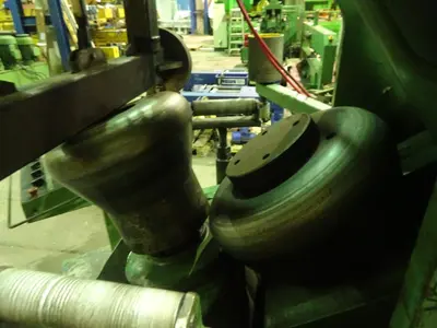 USED HAEUSLER FLANGING MACHINE