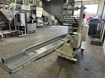 USED DOBOY PACKAGING MACHINERY INC MUSTANG