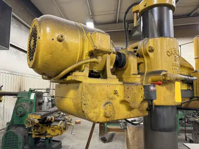 3' X 11" CARLTON RADIAL ARM DRILL. STOCK # 1113924.