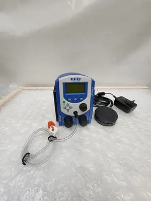 NORDSON EFD LLC EFD ULTIMUS DISPENSER 7002003 WITH EFD 2422-1 FOOT PEDAL