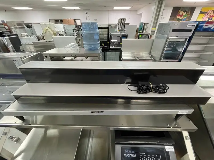 Used Baseline Used LED Baseline 44" 2 Tier LED Lighted Liquor Display Bar Shelf 120V Black Bar Equipment Illinois US | Falcon Restaurant Supply #1376393