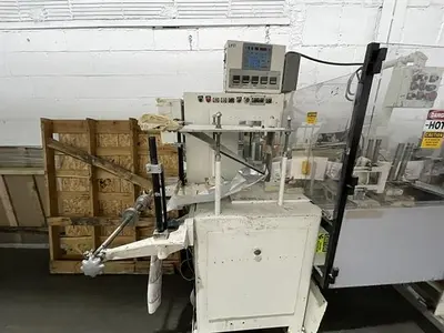 Bartelt model IM7-12 Pouch Packager with AMS Auger Filler