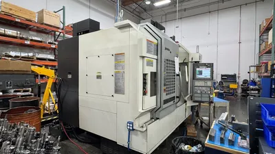 2016 OKUMA GENOS M560-V Vertical Machining Centers | Machinery Network (4)