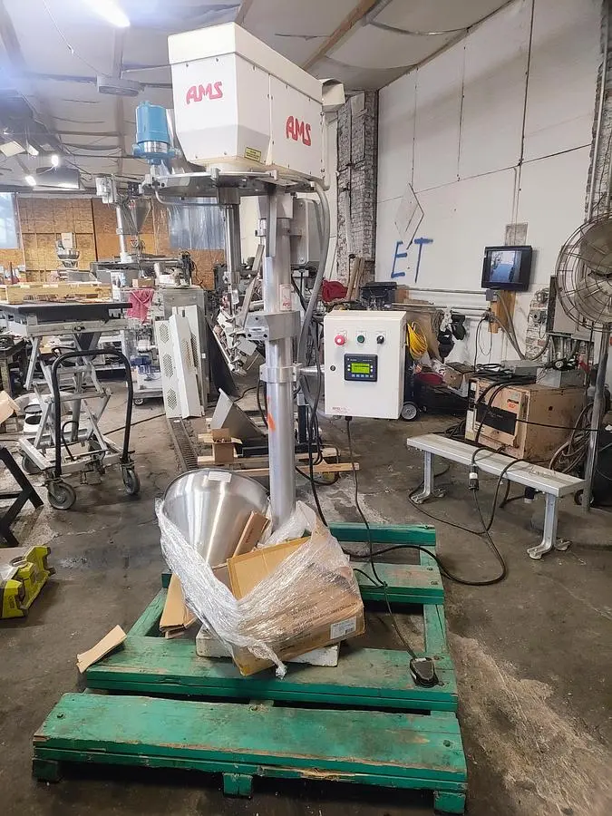 AMS  #A100-auger filler with foot pedal control