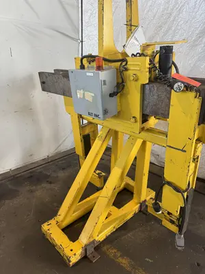10,000 LBS ADJUSTABLE POWERED COIL GRABBER. STOCK # 0917219