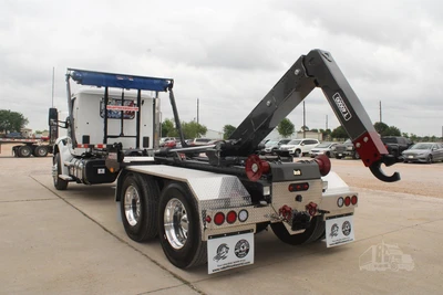Used 2027 PETERBILT 548 Hooklifts & Roll-Offs Texas US | Roll Off Truck World #1491992