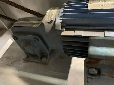 Pneumatic Press on Chain Conveyor