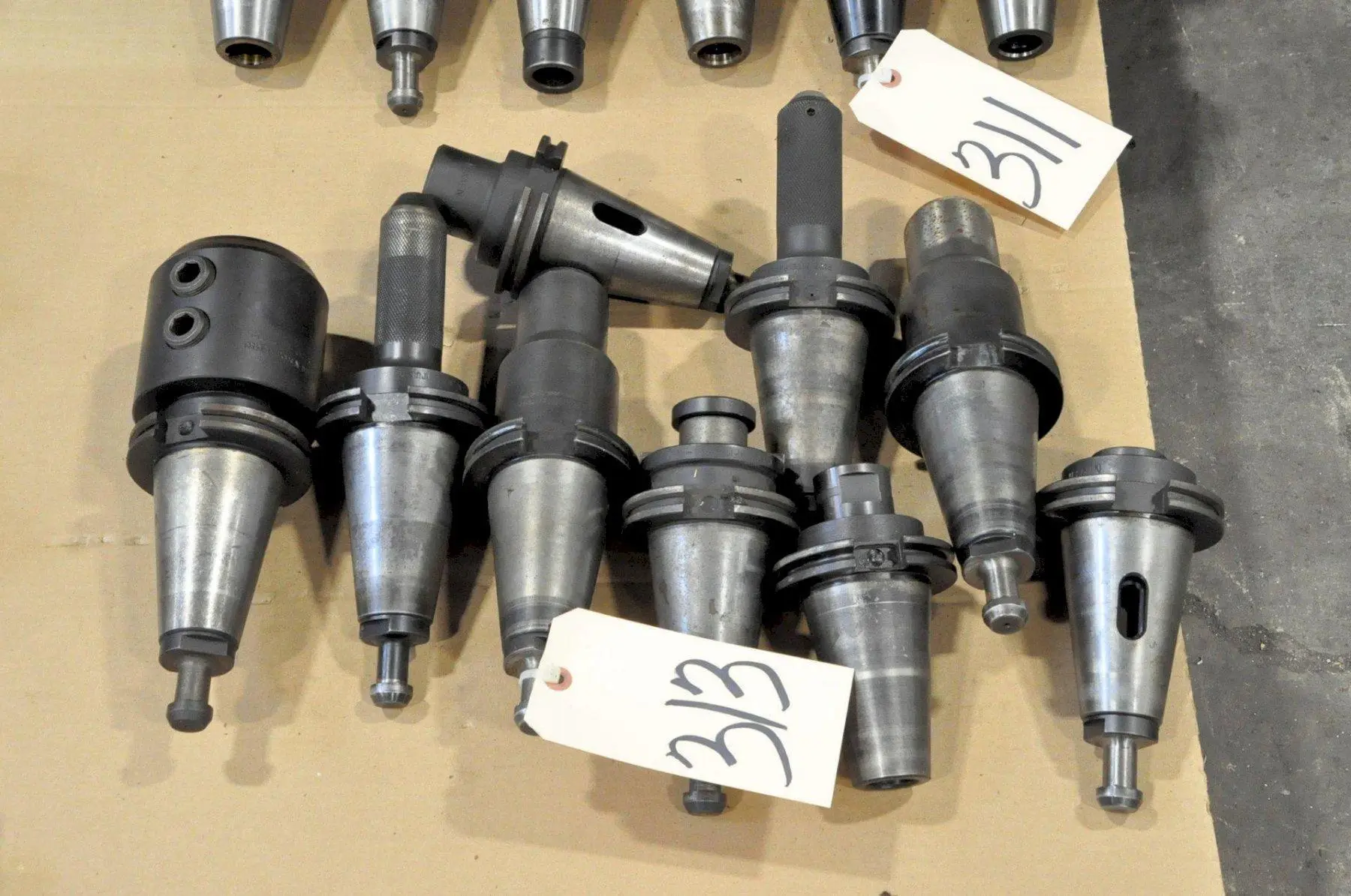 (9) CAT50 TAPER TOOL HOLDERS. STOCK # 0951920