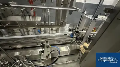 USED Capmatic Capmatic Bottle Filling Line