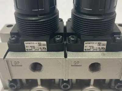 USED SMC DUAL-REGULATOR MODULAR MANIFOLD 1/4" NPT