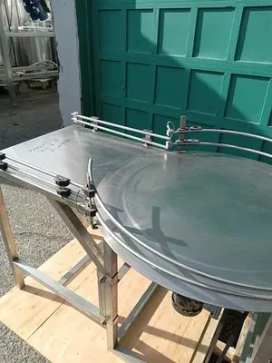 USED INLINE FILLING SYSTEMS 36" ROTARY DUMP/FEED TABLE (EXP. PROOF)