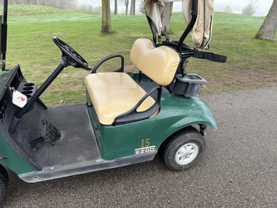 (1) 2015 E-Z-Go golf cart with a Kawasaki gas engine, includes Club canopy, ball washer, fold-down w...