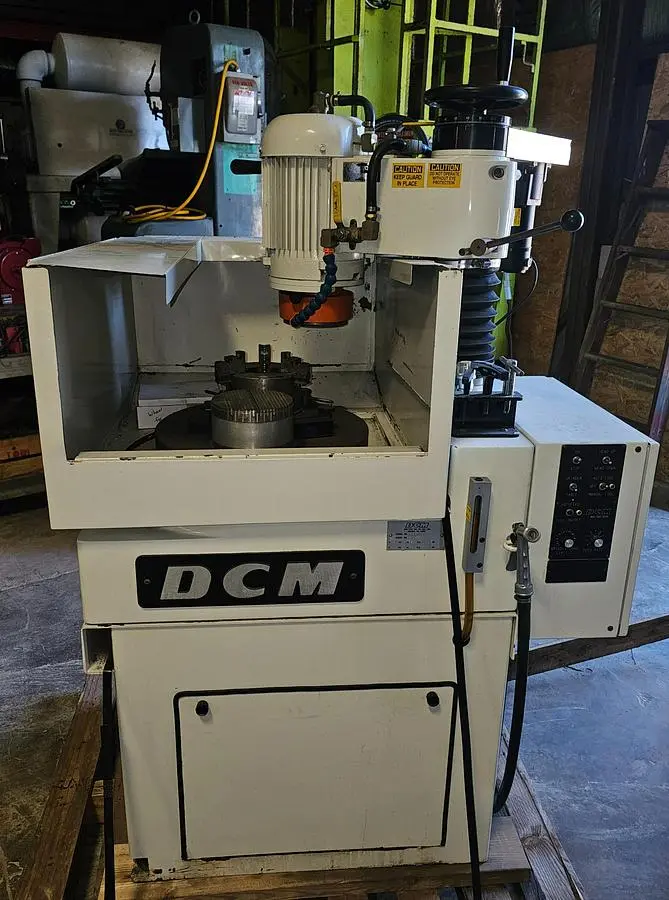 USED 2002 DCM PDG