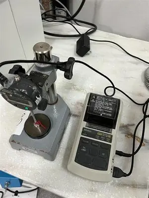Mitutoyo model 7004 thickness tester with Mitutoyo model DP-1VR Digimatic mini processor printer