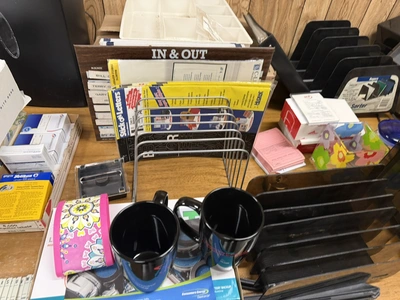 (1) 80" wooden desk with contents, includes paper shredder, paper organizers, Rolodex cards, coffee ...