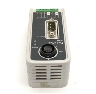 Used KEYENCE DEDICATED COMMUNICATION UNIT, RS-232C TYPE 24VDC Misc Industrial Equipment | Maverick Industrial Sales #1107118