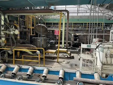 310 mm (12.205") & 680 mm (.039") x 1575 mm (62") Spidem/Fata Foil Mill (Used)