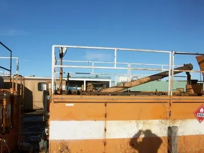 USED 20 M3 (120 BBL) SKID MOUNTED 2 COMPARTMENT MUD TANK