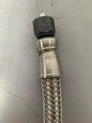 USED 35" STAINLESS STEEL BRAIDED HOSE W/ 5/8" SWAGELOK 316 3100 PSIG CONNECTION