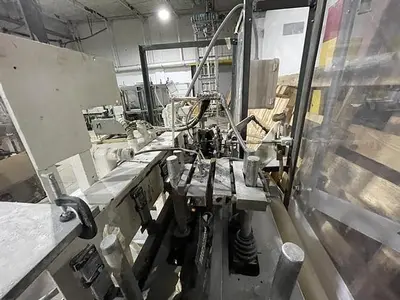 Bartelt model IM7 Pouch Packager with AMS Auger Filler and  liquid filler