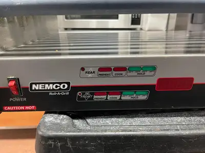 Used Nemco Used Nemco 8250SX-SLT Digital Hot Dog Roller Grill 50 Hot Dog Capacity 120V AS IS Grills & Griddles Illinois US | Falcon Restaurant Supply #1376233