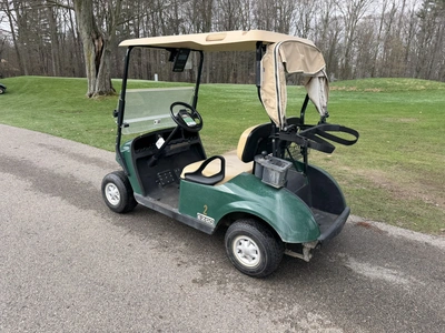 (1) 2015 E-Z-Go golf cart with a Kawasaki gas engine, includes Club canopy and ball washer, fold-dow...