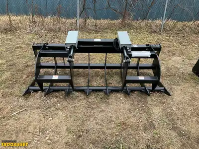 New Tomahawk 78” brush grapple attachment, two hydraulic grapple arms, skid steer quick attach