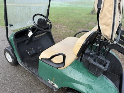 (1) 2015 E-Z-Go golf cart with a Kawasaki gas engine, includes canopy, ball cover, club cover, fold-...