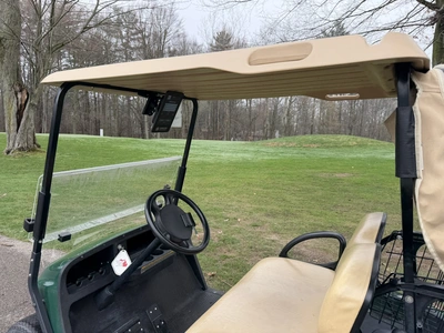 (1) 2015 E-Z-Go golf cart with a Kawasaki gas engine, includes ball washer and Club canopy, ball cov...