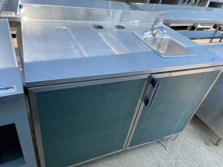 Used Duke Used 48" Duke Stainless Steel Work Counter with Sink and storage - SS245 Food Prep Tables Illinois US | Falcon Restaurant Supply #1375963