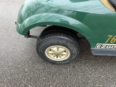 (1) 2014 E-Z-Go golf cart with a Kawasaki gas engine, includes canopy, ball carrier, fold-down winds...