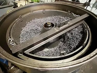 Tolhurst 48" chip wringer/oil extractor.