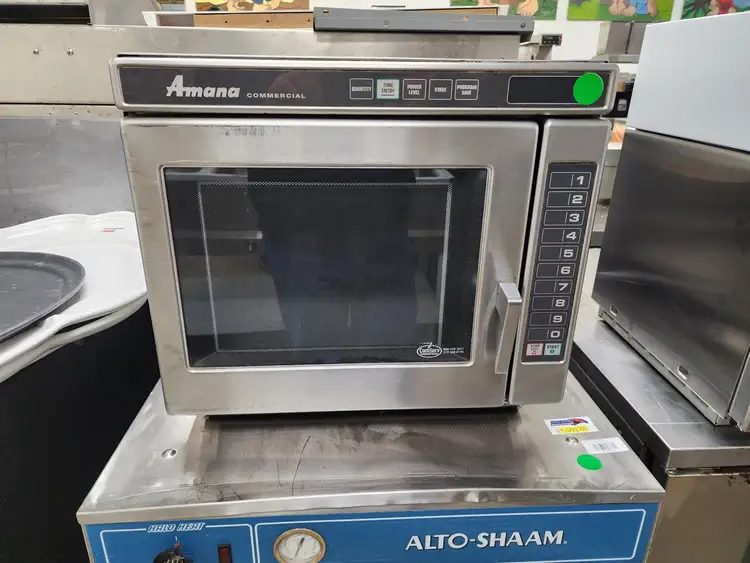 Used Amana Used Amana Heavy-Duty Stainless Steel Commercial Microwave Oven with Push Button Controls – 1700W Ovens Illinois US | Falcon Restaurant Supply #1376739
