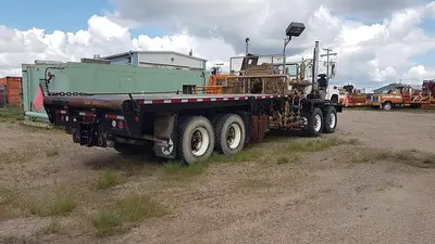 USED 1980 MACK DM600 TWIN STEER HEAVY DUTY OILFIELD PUMP / KILL TRUCK