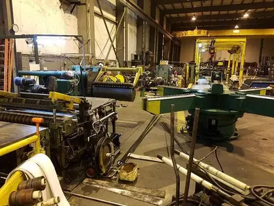 48" X 25,000 LBS. STAMCO SLITTING LINE (USED)