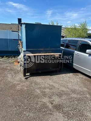 USED HYDRAPAK MODEL 1500 2 YARD STATIONARY WITH 40 YARD RECEIVER BOX