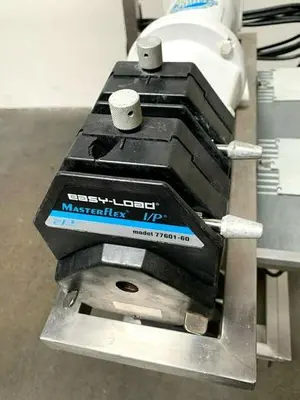 USED DOUBLE MASTER FLEX I/P 77601-60 PERISTALTIC PUMP SKID W/ 1/2 HP MOTOR & DRIVE