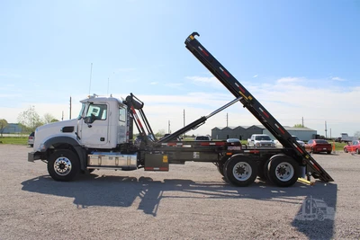 New | in-Stock 2025 MACK GRANITE 64BR Rolloff Trucks Texas US | Roll Off Truck World #1491919